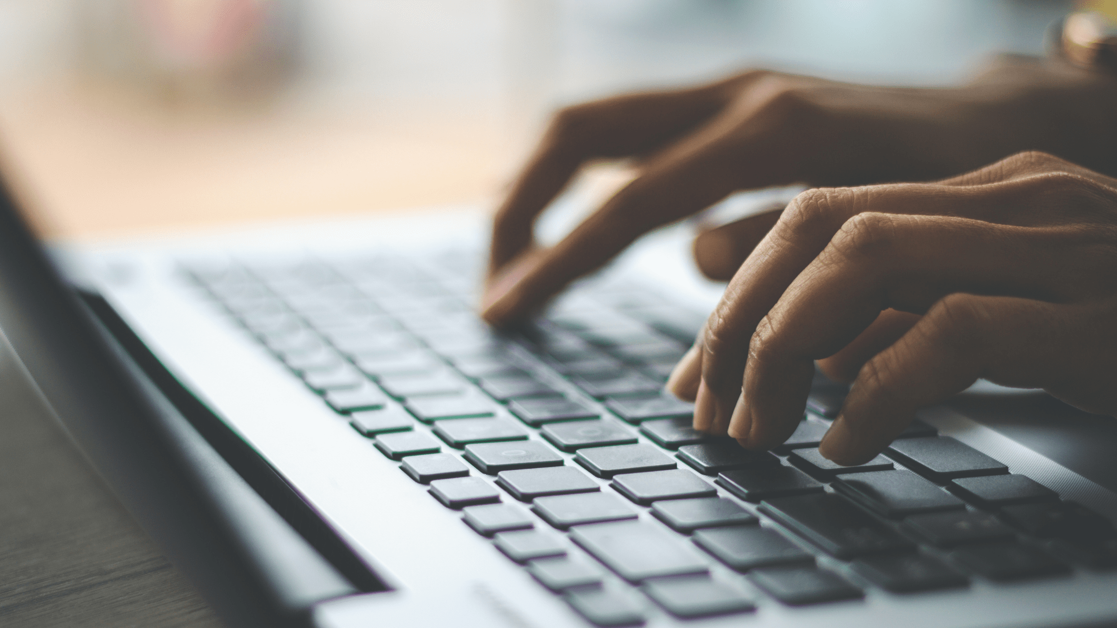 A student using a laptop to male an AMCAS application